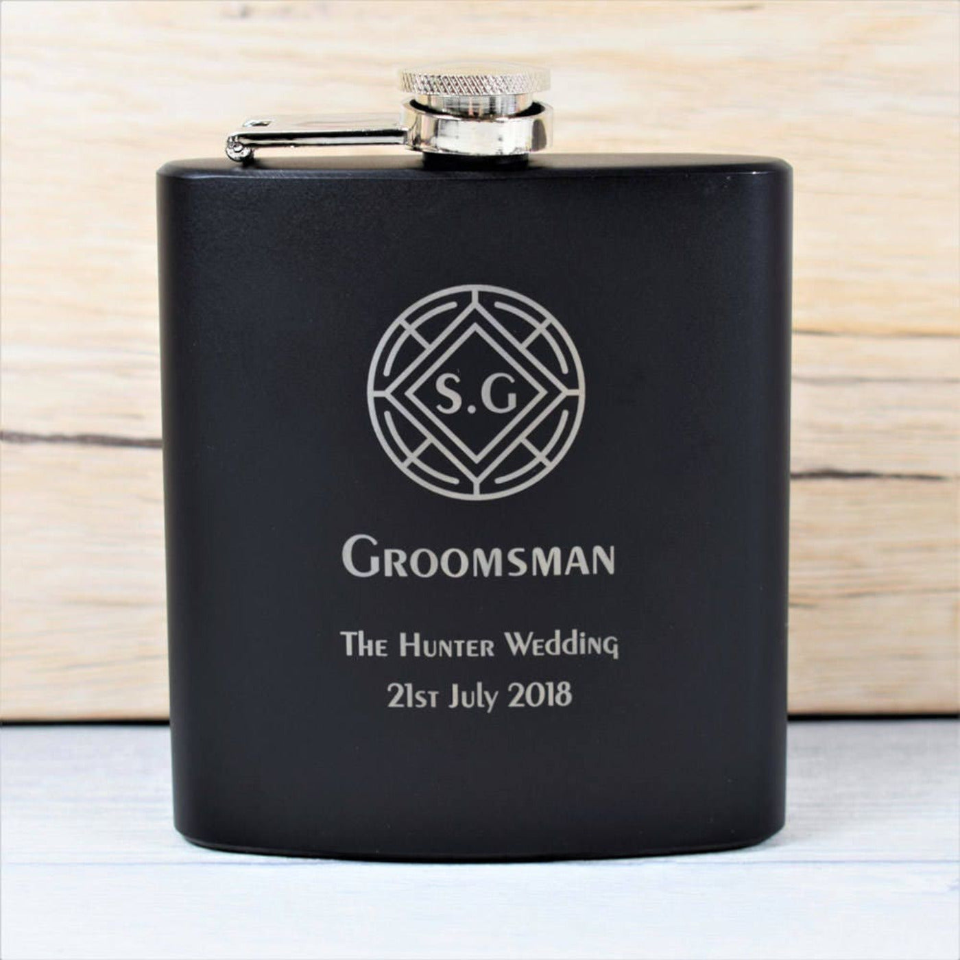Personalised Black Wedding Hip Flask With Round Crest Design
